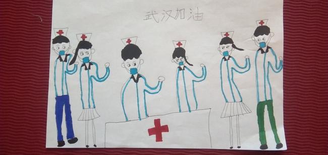 2.孩子们用画笔向白衣天使和武汉加油
